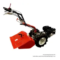 Geräteträger E450 mit montierter Gartenfräse 